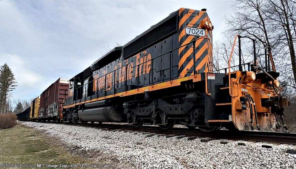 WE 7024 is out on the Wheeling main at Plum Creek Park in Kent.